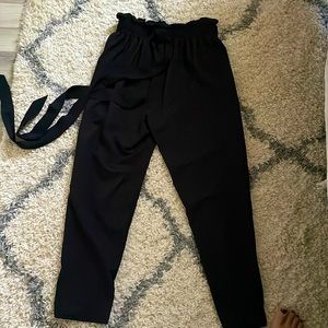 Black drawstring bag pant.